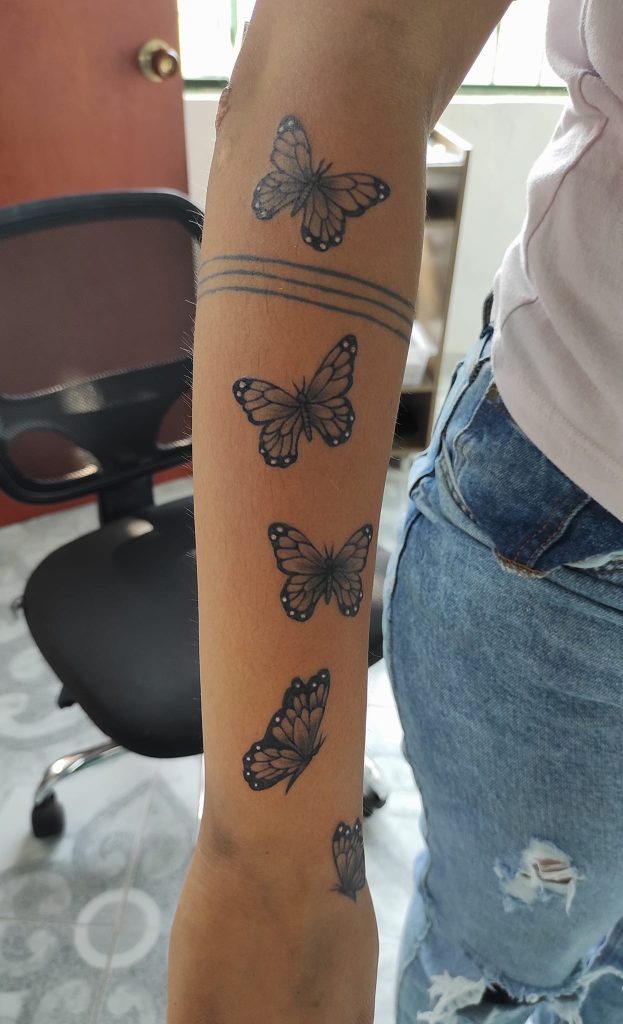 Tatuajes de mariposas en el brazo
